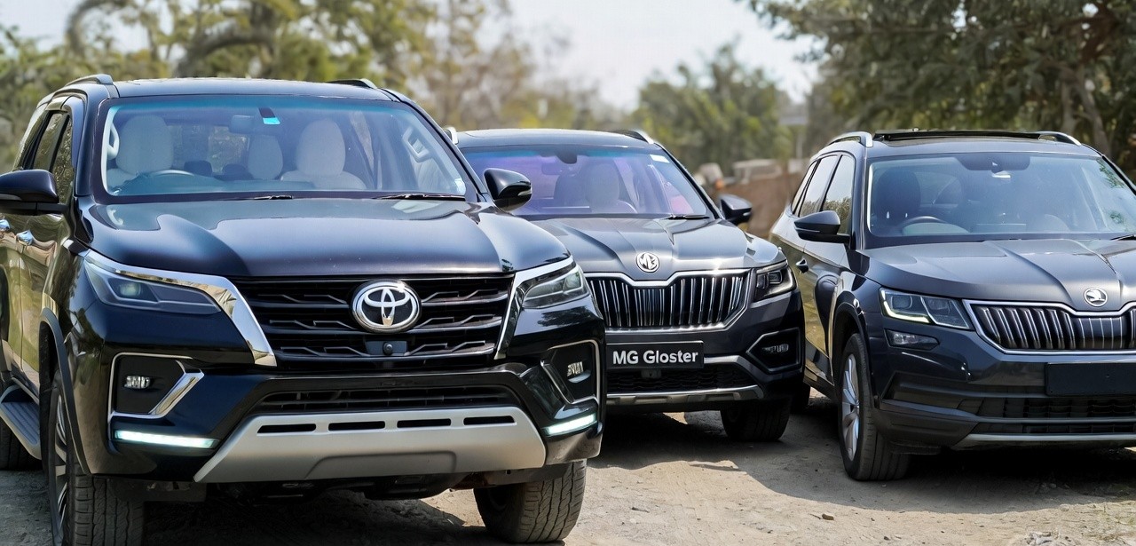 Toyota Fortuner compared with MG Gloster and Skoda Kodiaq.