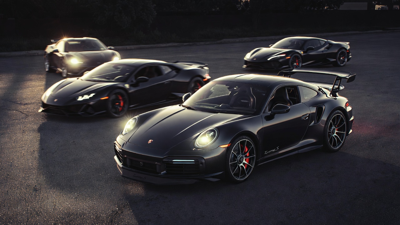 Porsche 911 Turbo S compared with Lamborghini Huracan EVO and Ferrari F8 Tributo.