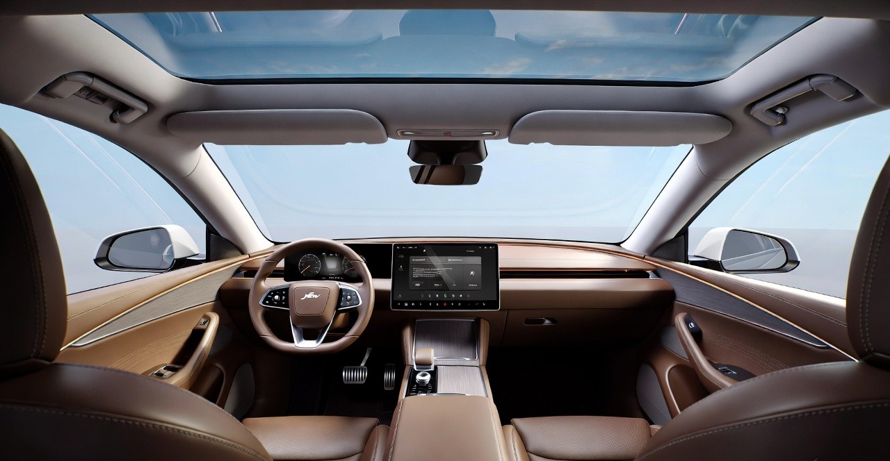 JSW Jetour T2 interior with large touchscreen and digital instrument cluster.