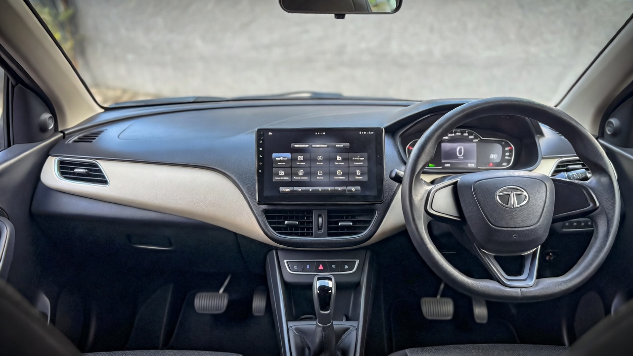Tata Tiago EV interior with touchscreen and digital instrument cluster.