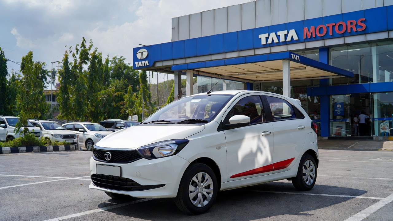Tata Tiago at service center representing ownership experience.