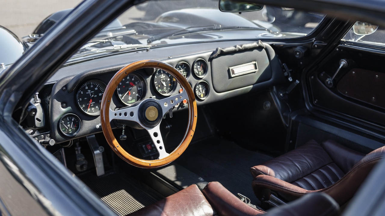 "Minimal driver-focused interior of the Ford GT40 endurance race car"