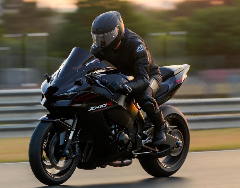 Kawasaki Ninja ZX10R 2025 racing on track at sunrise