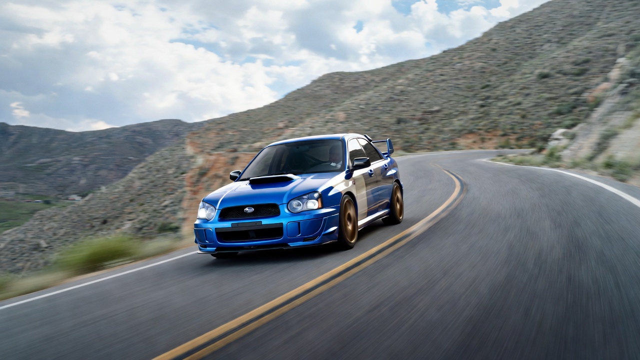 Subaru Impreza WRX STI symmetrical all-wheel drive handling on road