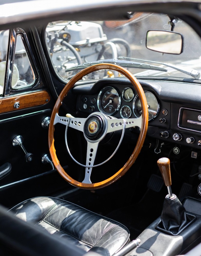 Interior dashboard of Volvo P1800 classic car.