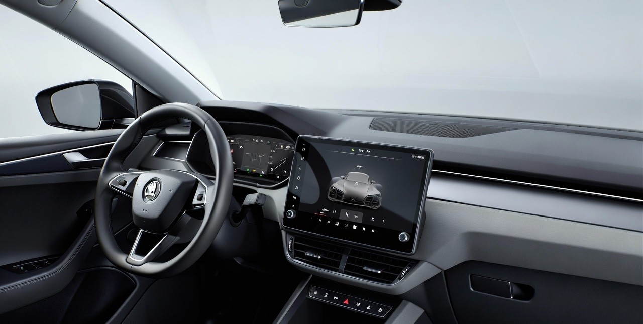 Skoda Kylaq interior dashboard with touchscreen infotainment system.