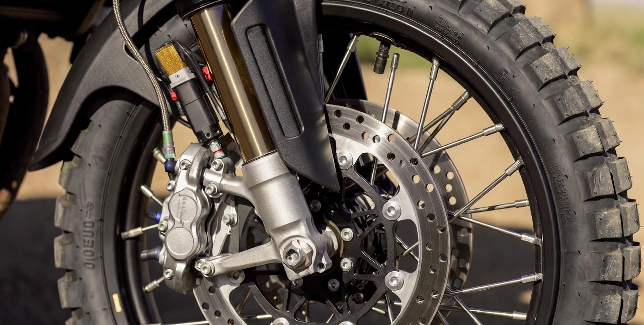 Front disc brake and ABS system of TVS Apache RTX 300 adventure motorcycle.