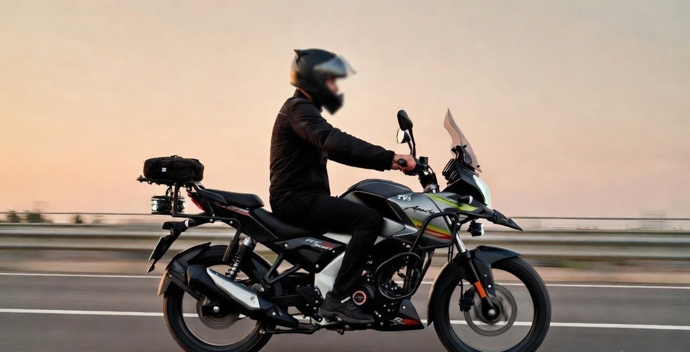 Rider sitting on TVS Apache RTX 300 showing upright riding position and touring ergonomics.